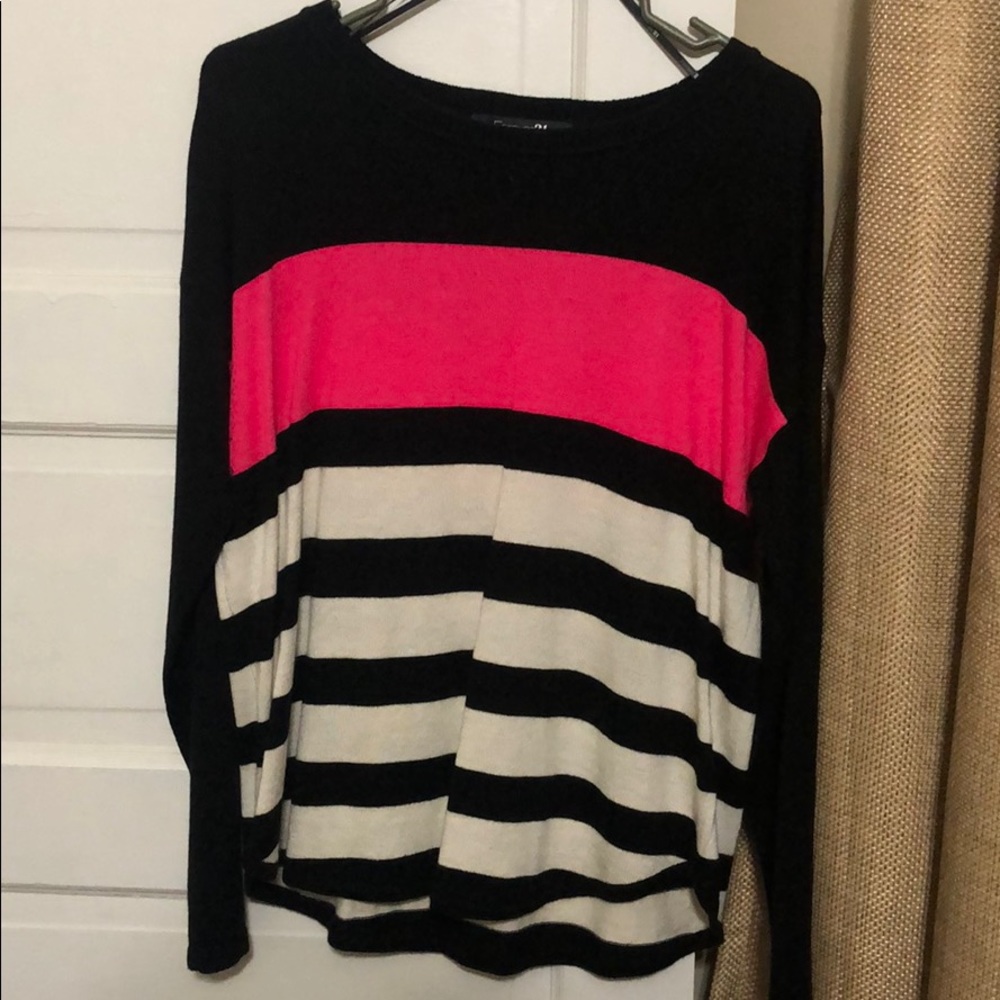Black, pink, and white striped sweater